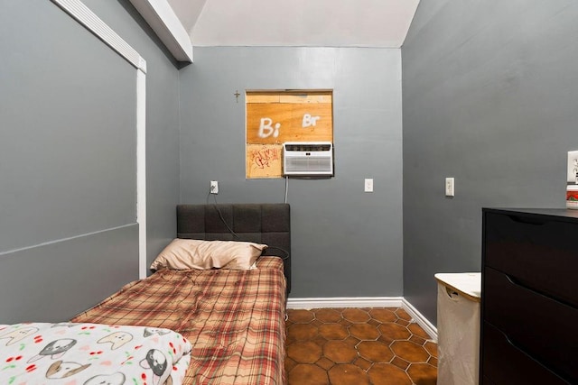 32 Brighton 2nd Pl, Brooklyn, NY 11235 - bedroom featuring vaulted ceiling and an AC wall unit