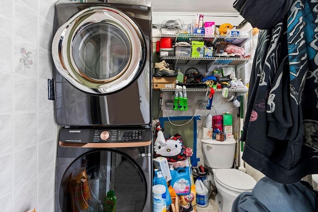 32 Brighton 2nd Pl, Brooklyn, NY 11235 - laundry area featuring stacked washer / dryer