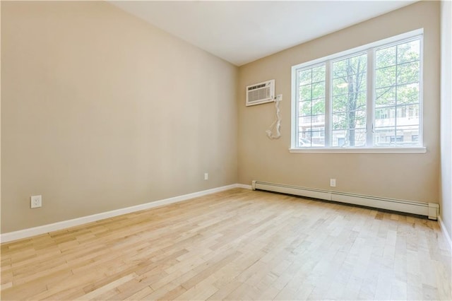 1570 W 10th St Unit 1B, Brooklyn, NY 11204 - unfurnished room with a baseboard radiator, wood finished floors, baseboards, and a wall mounted air conditioner
