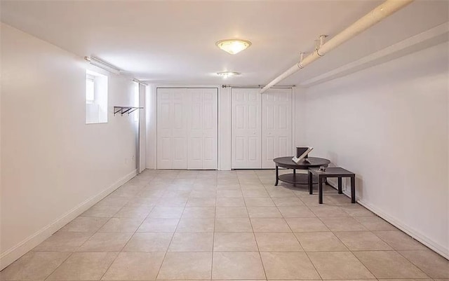 1745 E 21st St, Brooklyn, NY 11229 - basement featuring light tile patterned floors and baseboards