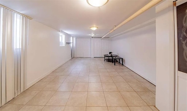 1745 E 21st St, Brooklyn, NY 11229 - below grade area featuring light tile patterned flooring