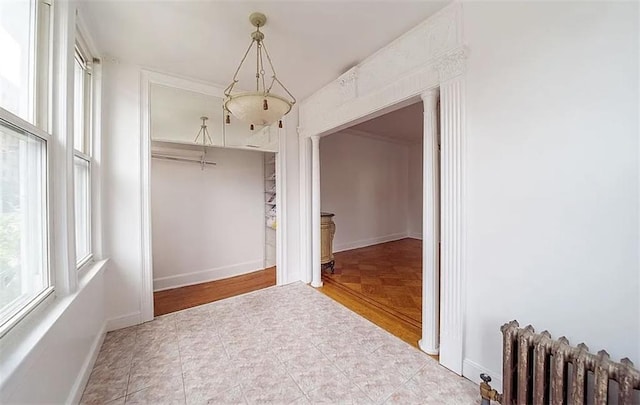 1745 E 21st St, Brooklyn, NY 11229 - hallway featuring radiator heating unit and baseboards