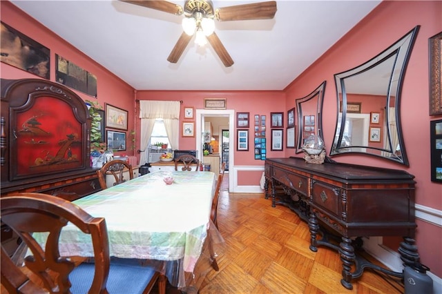 32 Gatling Pl, Brooklyn, NY 11209 - dining space with ceiling fan and a wainscoted wall