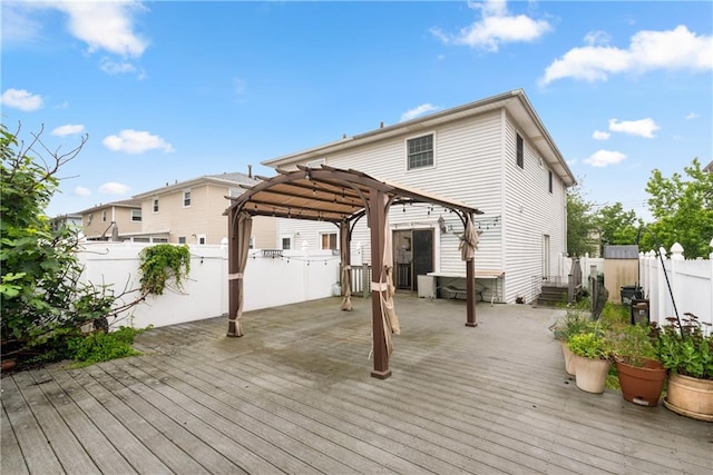 41 Bent St, Staten Island, NY 10312 - wooden deck featuring a pergola and a fenced backyard