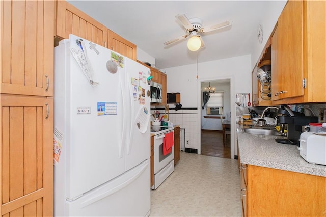 4070 Victory Blvd, Staten Island, NY 10314 - kitchen with white appliances, ceiling fan, light countertops, tile walls, and light floors