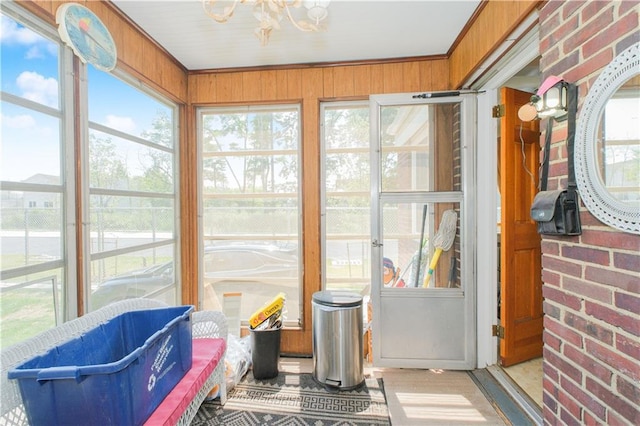 4070 Victory Blvd, Staten Island, NY 10314 - sunroom / solarium with a chandelier and brick wall