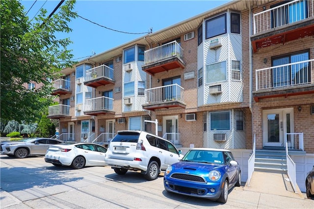 1205 65th St Unit A, Brooklyn, NY 11219 - view of apartment building / complex with uncovered parking