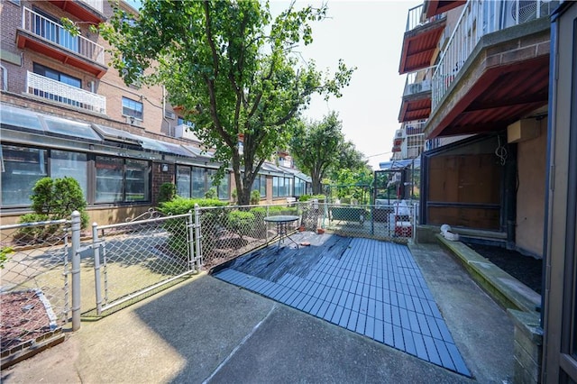 1205 65th St Unit A, Brooklyn, NY 11219 - view of patio featuring a gate