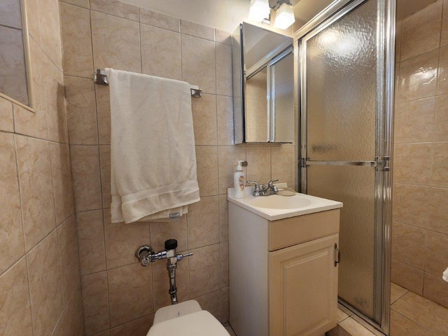 2251 Plumb St Unit 6B, Brooklyn, NY 11229 - full bath featuring a shower stall, vanity, and tile walls