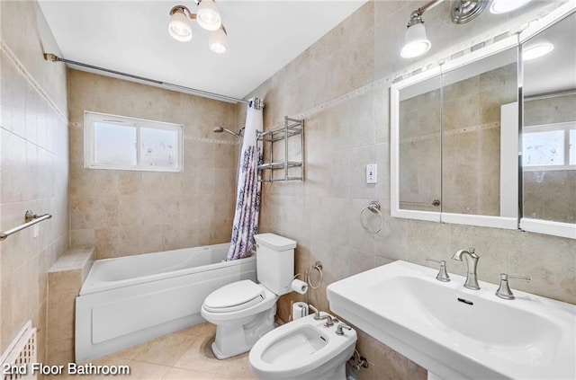 2160 E 36th St, Brooklyn, NY 11234 - full bath featuring tile walls, shower / bath combo, a bidet, and tile patterned floors