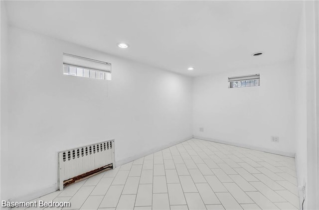 2160 E 36th St, Brooklyn, NY 11234 - unfurnished room featuring radiator and recessed lighting