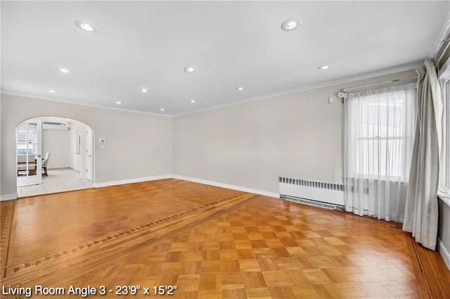 2160 E 36th St, Brooklyn, NY 11234 - empty room with arched walkways, radiator heating unit, plenty of natural light, recessed lighting, and ornamental molding