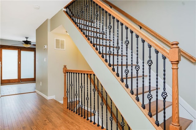 61 Avon Ln, Staten Island, NY 10314 - stairway featuring hardwood / wood-style floors and ceiling fan