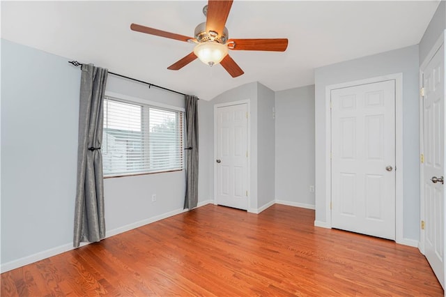 61 Avon Ln, Staten Island, NY 10314 - unfurnished bedroom with light wood-style flooring and ceiling fan