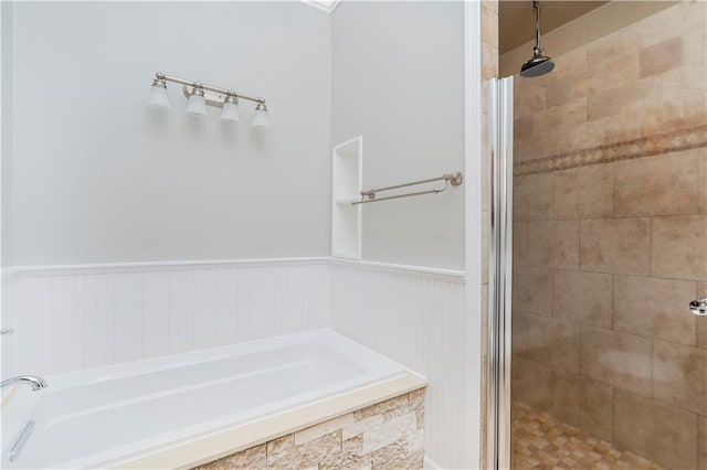 61 Avon Ln, Staten Island, NY 10314 - full bathroom with a garden tub, a stall shower, and a wainscoted wall