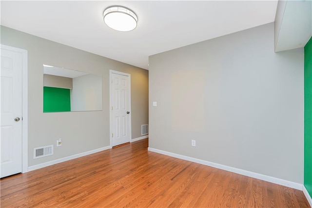 61 Avon Ln, Staten Island, NY 10314 - unfurnished room featuring light wood-style flooring and baseboards