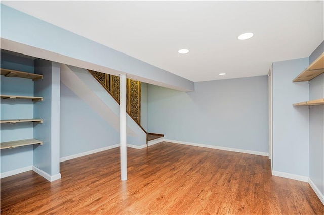 61 Avon Ln, Staten Island, NY 10314 - finished below grade area featuring wood finished floors, recessed lighting, and stairs