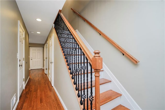 61 Avon Ln, Staten Island, NY 10314 - stairs with wood finished floors and recessed lighting