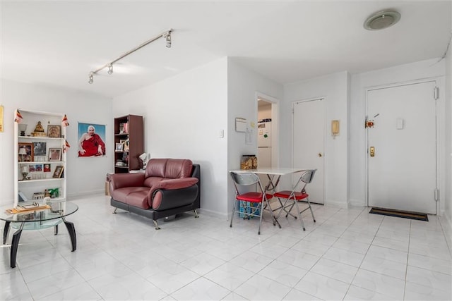 735 Avenue W Unit 6J, Brooklyn, NY 11223 - living area with rail lighting