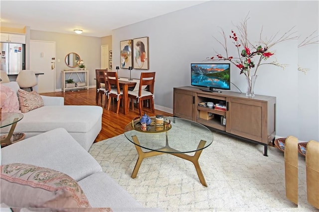 9323 Shore Rd Unit 4G, Brooklyn, NY 11209 - living room featuring wood finished floors and baseboards