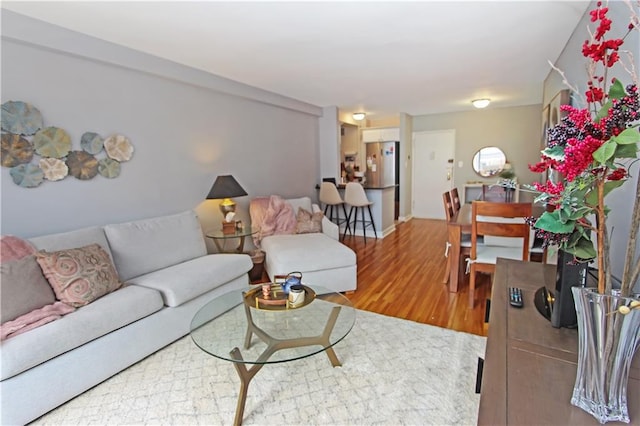 9323 Shore Rd Unit 4G, Brooklyn, NY 11209 - living area featuring light wood-style flooring