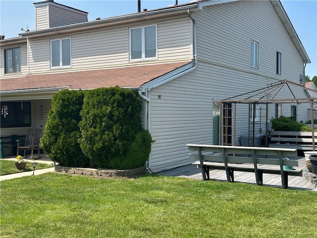 30 Regis Dr Unit 76, Staten Island, NY 10314 - back of house featuring a yard, a gazebo, a deck, and a chimney