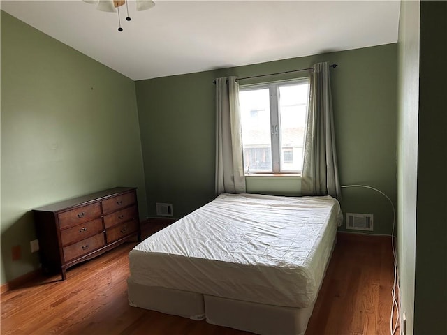 30 Regis Dr Unit 76, Staten Island, NY 10314 - bedroom with wood finished floors and vaulted ceiling
