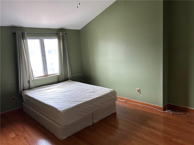 30 Regis Dr Unit 76, Staten Island, NY 10314 - bedroom with wood finished floors and vaulted ceiling