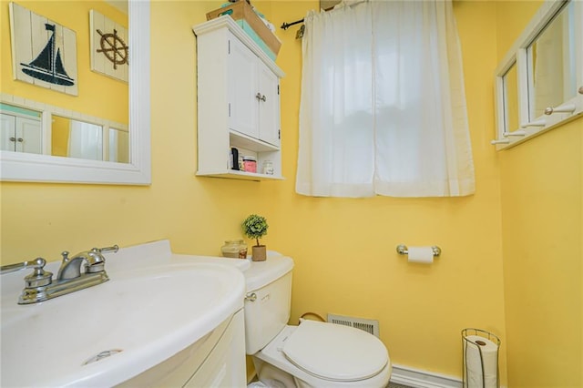 46 Mosely Ave, Staten Island, NY 10312 - bathroom with a baseboard radiator and vanity