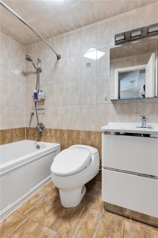 135 28th Ave Unit 2A, Brooklyn, NY 11214 - bathroom with tile walls,  shower combination, vanity, and tile patterned floors