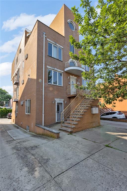 135 28th Ave Unit 2A, Brooklyn, NY 11214 - view of building exterior with stairs