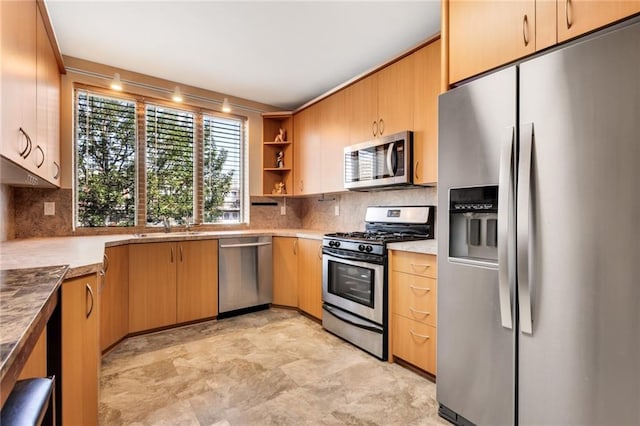 135 28th Ave Unit 2A, Brooklyn, NY 11214 - kitchen with appliances with stainless steel finishes, open shelves, decorative backsplash, and light countertops