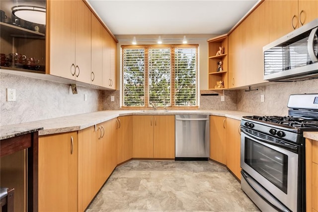 135 28th Ave Unit 2A, Brooklyn, NY 11214 - kitchen featuring appliances with stainless steel finishes, open shelves, decorative backsplash, and light stone countertops