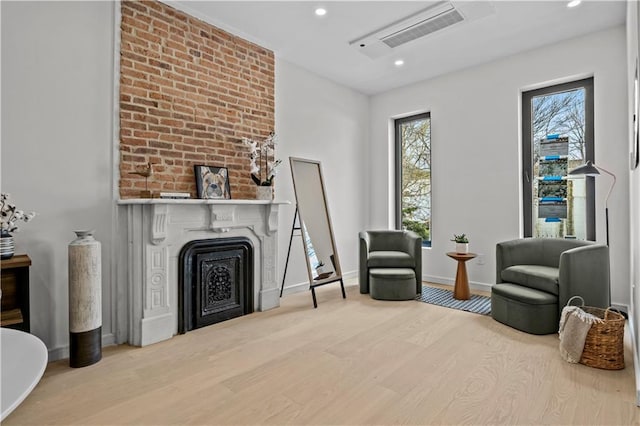 320 10th St, Brooklyn, NY 11215 - living area featuring wood finished floors, recessed lighting, and a large fireplace