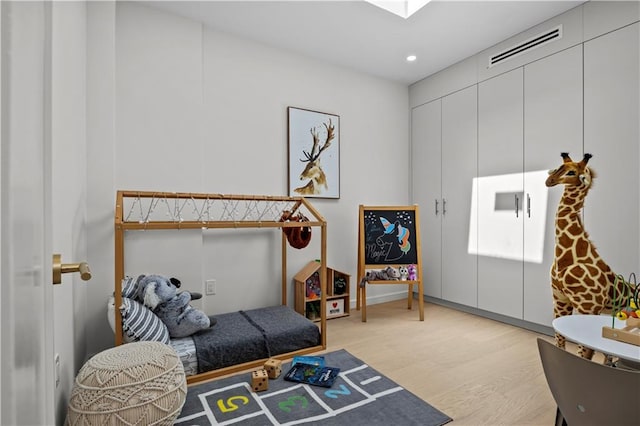 320 10th St, Brooklyn, NY 11215 - bedroom featuring light wood-style flooring and recessed lighting