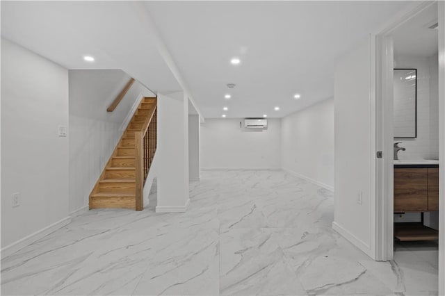 320 10th St, Brooklyn, NY 11215 - finished below grade area featuring stairs, recessed lighting, marble finish flooring, and an AC wall unit