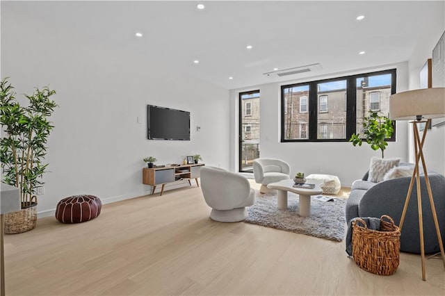 320 10th St, Brooklyn, NY 11215 - living room featuring wood finished floors and recessed lighting