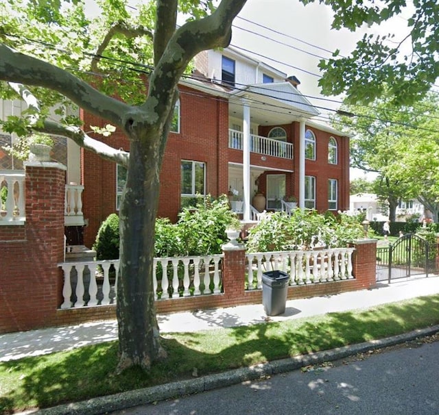 38 Bassett Ave, Brooklyn, NY 11234 - view of building exterior with a fenced front yard