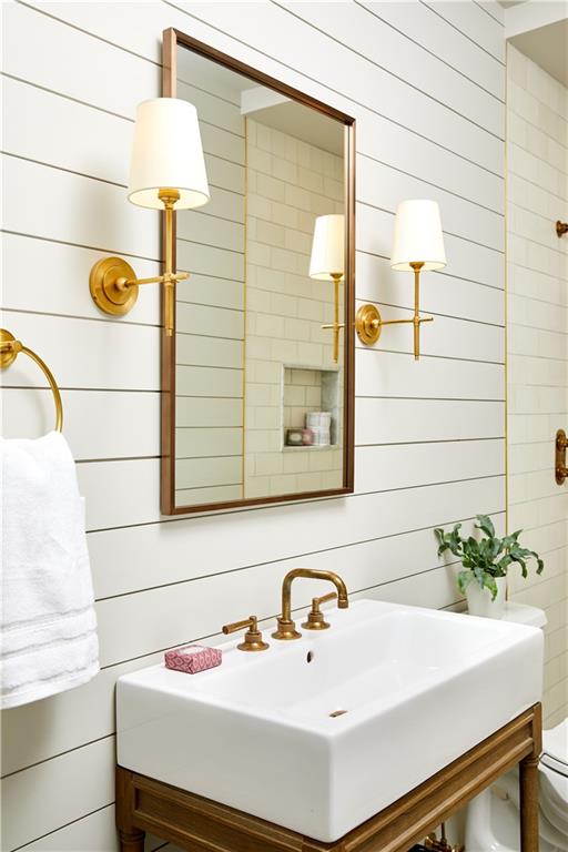 274 S Railroad St, Staten Island, NY 10312 - bathroom featuring wood walls