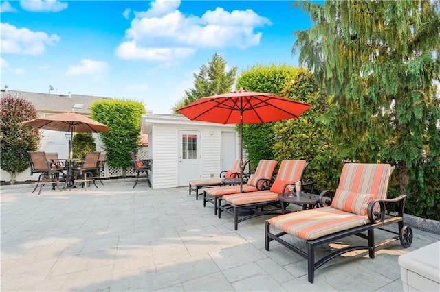 274 S Railroad St, Staten Island, NY 10312 - view of patio featuring an outbuilding