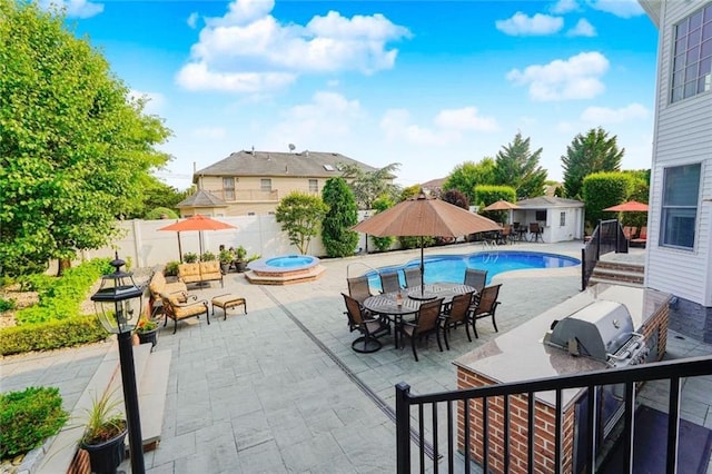 274 S Railroad St, Staten Island, NY 10312 - view of pool featuring a patio, a fenced backyard, outdoor dining area, and an in-ground hot tub