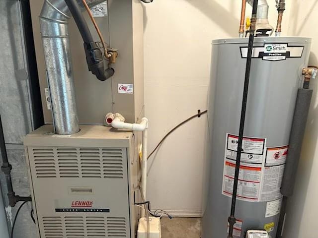30 Winegar Ln, Staten Island, NY 10310 - utility room with gas water heater and heating unit