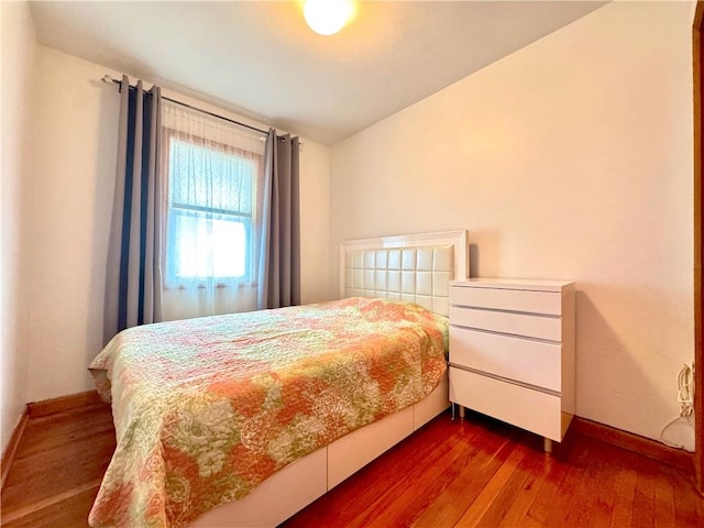 3516 Fillmore Ave, Brooklyn, NY 11234 - bedroom featuring baseboards and dark wood-type flooring