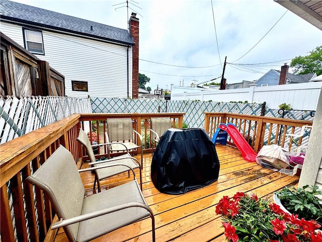 3516 Fillmore Ave, Brooklyn, NY 11234 - wooden terrace featuring a fenced backyard and grilling area