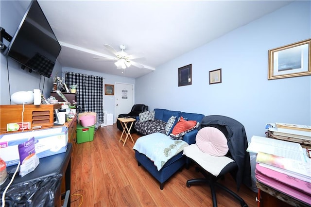 1296 E 54th St, Brooklyn, NY 11234 - living area featuring wood finished floors and a ceiling fan