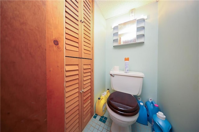 1296 E 54th St, Brooklyn, NY 11234 - bathroom with a closet and a textured ceiling