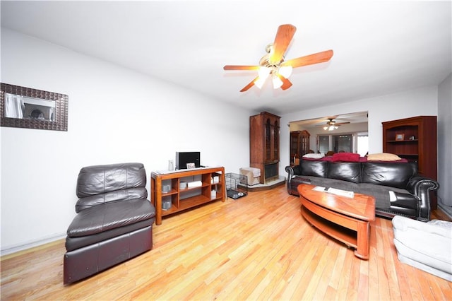 1296 E 54th St, Brooklyn, NY 11234 - living area with hardwood / wood-style flooring, a ceiling fan, and an office area