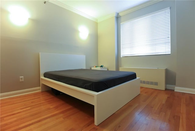 9935 Shore Rd Unit 1D, Brooklyn, NY 11209 - bedroom featuring crown molding and light wood finished floors