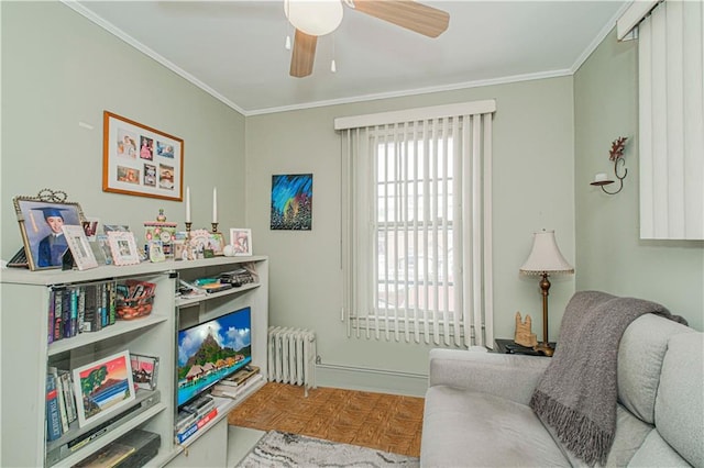 977 80th St, Brooklyn, NY 11228 - living area featuring radiator, crown molding, and a ceiling fan