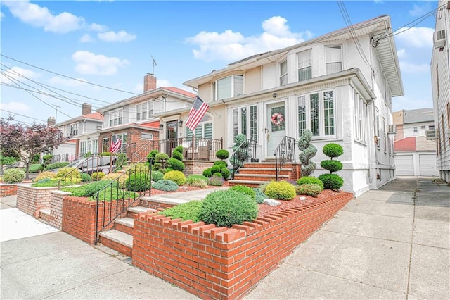 977 80th St, Brooklyn, NY 11228 - view of front of home with stucco siding